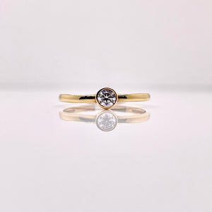 Bezel Set Women’s Dainty CZ Ring In 10 KT Yellow Gold
