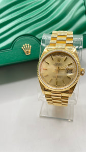 36mm 18 KT DayDate Rolex Watch With Champagne Dial & Presidential Band