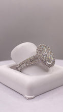 Load image into Gallery viewer, 3.23 CT. Lab Grown Oval Halo Diamond Engagement Ring With Wedding Band In 18 KT White Gold