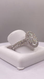 3.23 CT. Lab Grown Oval Halo Diamond Engagement Ring With Wedding Band In 18 KT White Gold