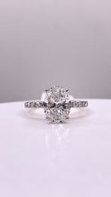 Load image into Gallery viewer, 2.49 CT. T.W Oval-Cut Certified Lab Created Diamond Engagement Ring In 18 KT Yellow Gold