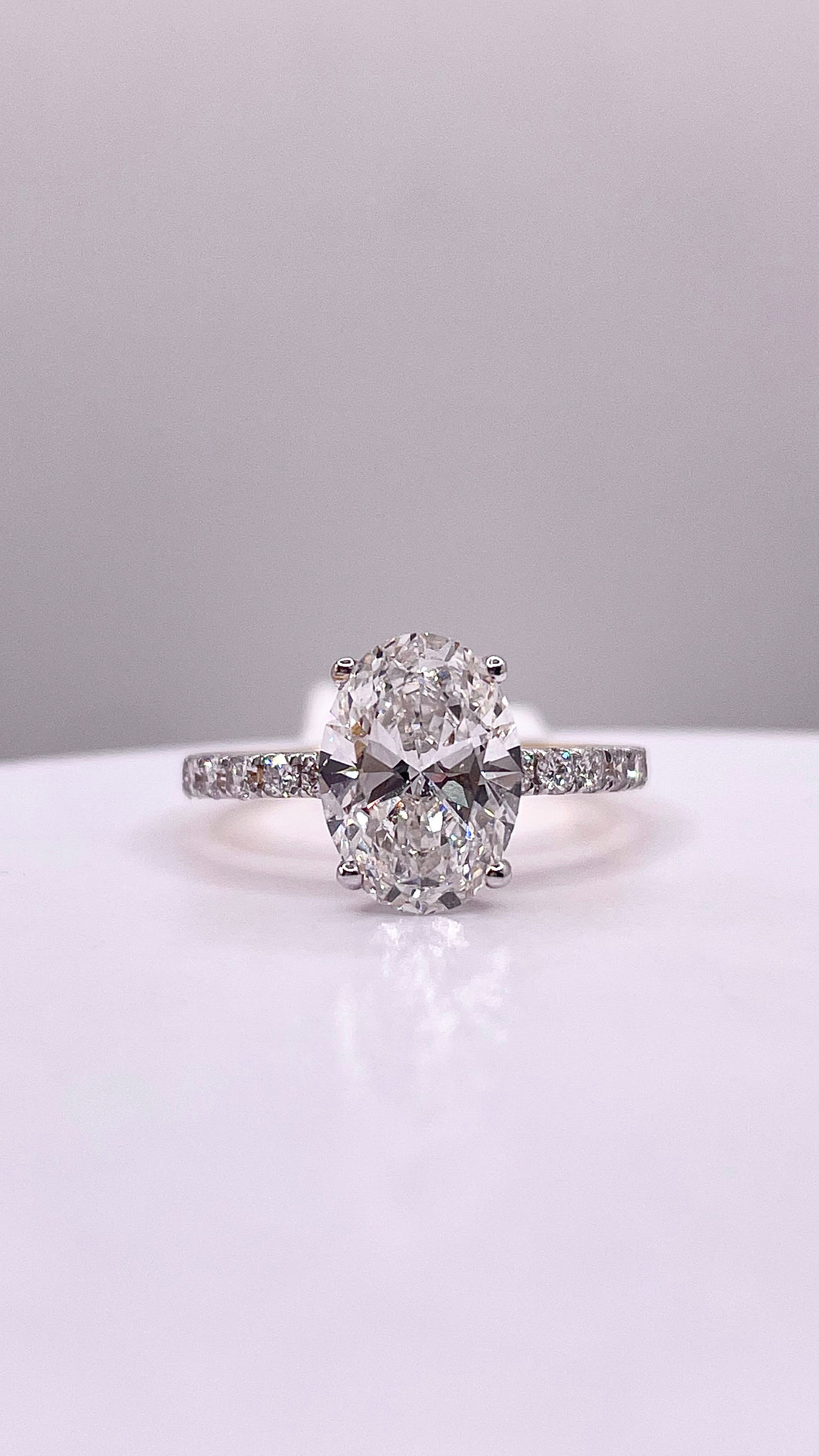 2.49 CT. T.W Oval-Cut Certified Lab Created Diamond Engagement Ring In 18 KT Yellow Gold