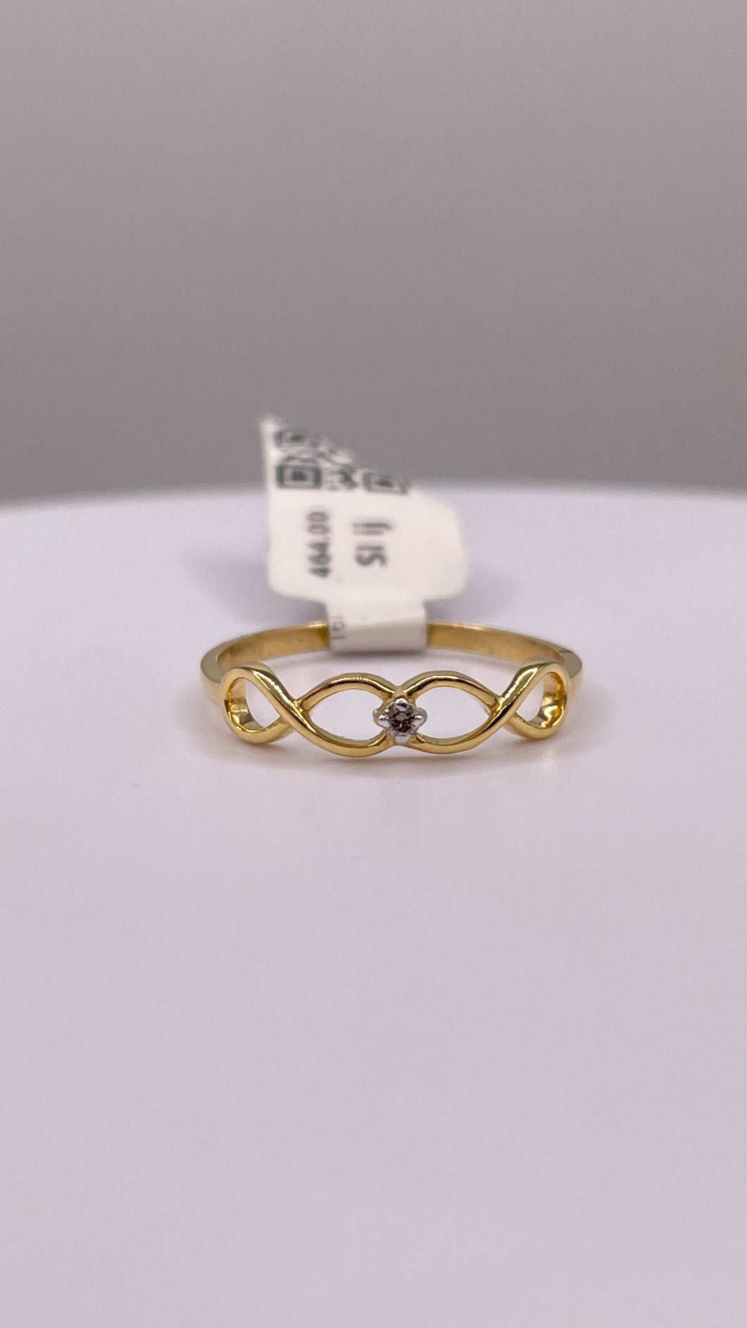 0.018 CT. Natural Diamond Infiniti Ring In 10 KT Yellow Gold