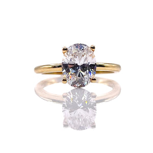 Oval Shape Ladies Ring In 10 KT Yellow Gold With CZ
