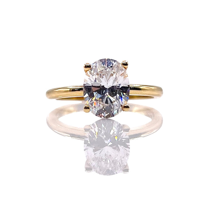 Oval Shape Ladies Ring In 10 KT Yellow Gold With CZ
