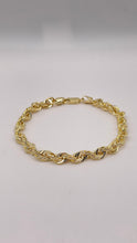 Load image into Gallery viewer, 6.4mm Diamond Cut Rope Chain In 10 KT Yellow Gold