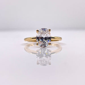 Oval Shape Ladies Ring In 10 KT Yellow Gold With CZ