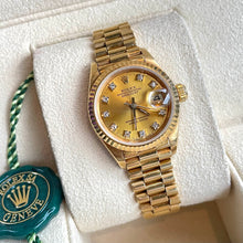 Load image into Gallery viewer, 26mm Women’s Presidential DateJust Rolex Watch With Champagne Diamond Dial In 18 KT Gold