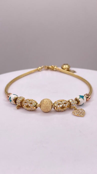 CZ Charm Bracelet In 14 KT Yellow Gold