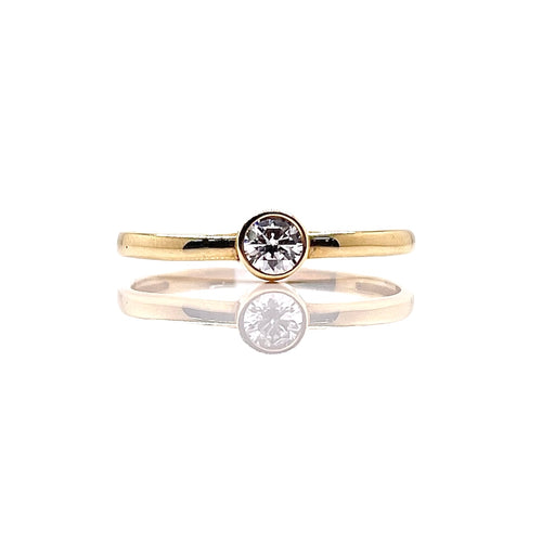 Bezel Set Women’s Dainty CZ Ring In 10 KT Yellow Gold