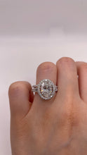 Load image into Gallery viewer, 3.23 CT. Lab Grown Oval Halo Diamond Engagement Ring With Wedding Band In 18 KT White Gold